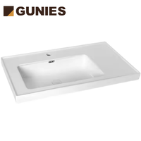 Lavabo de salle de bain rectangulaire moderne de luxe en céramique poli à poser sous le comptoir, avec drain, monotrou, écologique