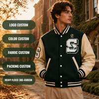 Veste universitaire pour homme en laine mélangée noire personnalisée 380GSM avec manches en cuir, boutons-pression, rayures et emblème en tricot côtelé