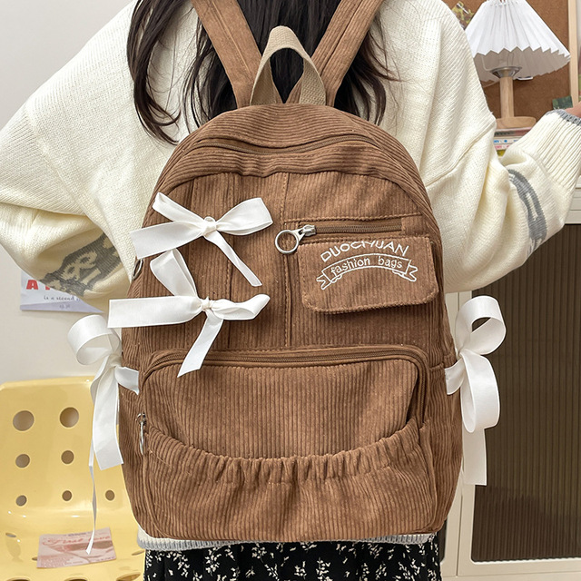 brown corduroy backpack jansport Blue Dusk Cross Town Dash Forward The JanSport Right Pack Expressions Backpack combines the iconic Right Pack silhouette with premium materials and everyday functionality Empyre Venture Brown Corduroy Backpack