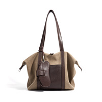 Sac fourre-tout à bandoulière en cuir véritable couleur unie, grande capacité, avec fermeture éclair, tendance et polyvalent, collection automne/hiver 2026, pour grossistes (ODM&OEM)
