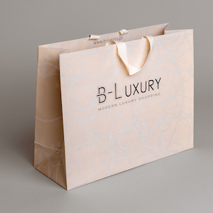 Sacs en papier kraft de luxe personnalisés et recyclables pour cadeaux et boutiques, avec poignée en ruban, fabriqués en carton durable, vente en gros - Product Image 2
