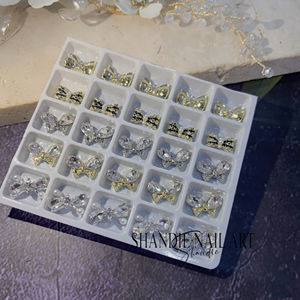 แพ็คผสม 20 ช่อง ใหม่ ปี 2023 ขายส่ง อุปกรณ์ตกแต่งเล็บ 3 มิติ โบว์ DIY สำหรับร้านเสริมสวย - Product Image 3