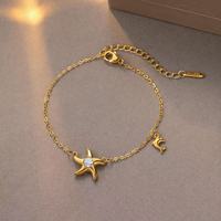 Ensemble de bijoux en acier inoxydable pour femmes, collier étoile de mer et bracelet dauphin, bijoux sur le thème de l'océan avec zircone