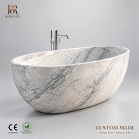Baignoire en marbre Calacatta Arabescato sculptée à la main, baignoire de luxe en pierre cannelée pour la décoration des salles de bain d'hôtels et de villas, sur mesure