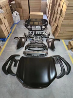 OUYE Nouveau Kit Carrosserie ABS Noir de Haute Qualité pour Pare-chocs de Voiture, Conversion Facelift 1:1, Phares et Capot, Installation Facile pour LC 200