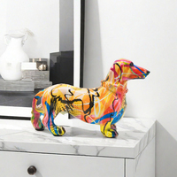 Décoration de maison moderne Sculpture animalière Figurine de chien teckel Statue de chien en résine graffiti