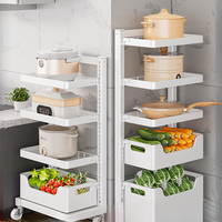 Meuble de rangement sous évier en métal à double niveau au design moderne et personnalisable, avec étagères efficaces pour cuisine et rangement d'épices