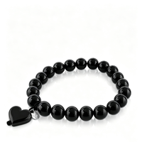 Demandez le catalogue : Bracelet élastique simple avec breloque cœur classique et perles en pierre, idéal comme cadeau.