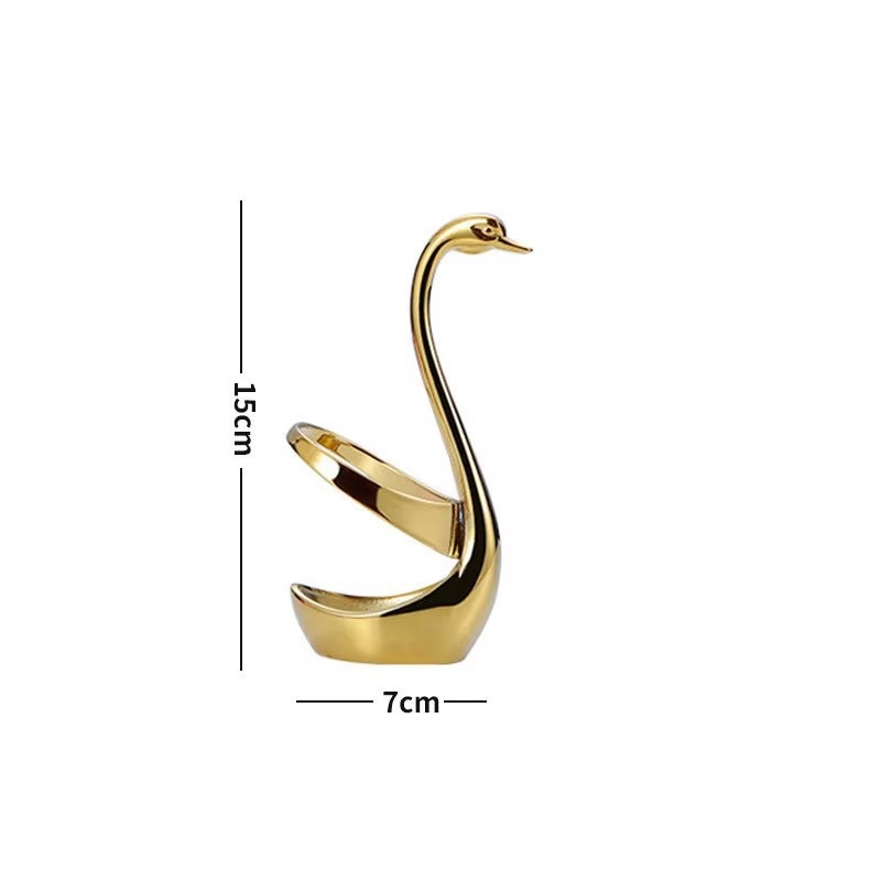 Base de cygne dorée