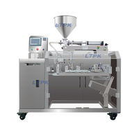 Machine d'emballage, de remplissage et de scellage pneumatique automatique horizontale pour sachets préformés de savon liquide, détergent, sauce, confiture, miel, crème, yaourt