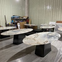 Meubles Gainsville Meubles de maison légers de luxe de forme ovale avec plateau en pierre Table à manger moderne en acier inoxydable Ensemble de table à manger