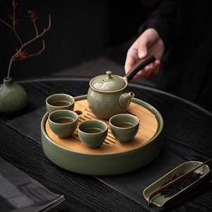 Juego de té de cerámica con tetera y cuatro tazas, diseño minimalista para uso doméstico, bandeja para té de burbujas seco con función de almacenamiento - Product Image 1