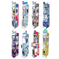 Distributeur automatique de luxe transparent en métal à monnayeur avec jeu populaire en anglais pour centres commerciaux