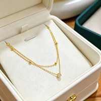 Collier de luxe empilable en acier inoxydable avec perles dorées et zircon, double couche, pour femme