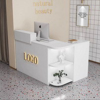 Bureau de réception moderne et durable avec lumière LED Design incurvé unique pour bureau, hôtel, salon de beauté ou centre commercial Fourniture en usine