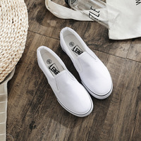 Chaussures plates en toile vulcanisée de bonne qualité, style slip-on, couleur blanche unie, pour femmes et hommes, baskets décontractées