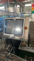 Ligne de machines de remplissage, de bouchage, de scellage par induction et de comptage pour petites bouteilles de bureau