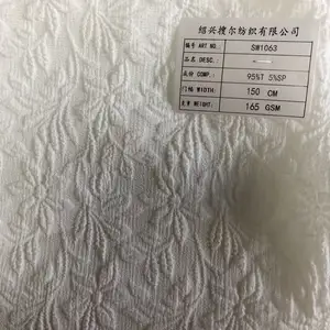 New Trends 3D Relief Leaf And Flower Jacquard 160gsm 4-ways Stretch Polyester Crinkle Texture Fabric For Dress Swimwear Coat