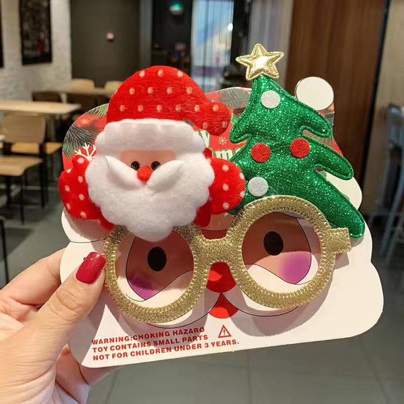 Elderly + Christmas tree with cardboard