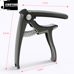 2024 Jingying Music Guitar Capo, Vente en gros 4 en 1 Capos de guitare acoustique multifonctionnels avec coupe-corde/extracteur de goupille/support de choix - Product Image 2