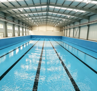 Piscine intérieure à faible entretien avec structure en acier galvanisé et construction étanche