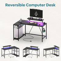 Bureau de jeu en forme de L avec lumières LED et station de charge Table de bureau moderne pour ordinateur de jeu avec étagères de rangement et bureau de travail