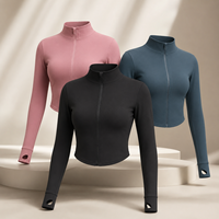 Veste athlétique ajustée pour femme, zippée intégralement ou à quart de zip, extensible, avec passe-pouces, idéale pour la course et l'entraînement (vente en gros)