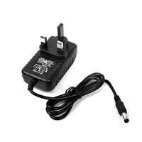 Adaptateur secteur 12V 2A avec prise UK, chargeur mural AC DC 24W CE FCC RoHS pour appareils électroniques, bandes lumineuses LED