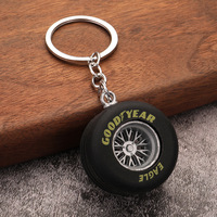 Porte-clés créatif et minimaliste en métal et caoutchouc, nouveau design, modèle de pneu imprimé, accessoires de voiture, cadeaux raffinés, usage quotidien