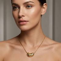 JUSNOVA Collier hypoallergénique en acier inoxydable plaqué or PVD 18K, résistant à l'eau et inaltérable, avec pendentifs croix, crabe, œil porte-bonheur et médaille en forme de haricot