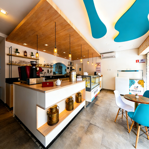 Airy Luxe Bakery & Coffee Market Stall Featuring Glass Display Case, Open Tiered Shelving, and Integrated Warm Lighting - Product Image 2