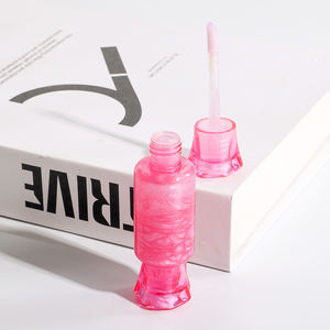 OEM ODM Huile de brillant à lèvres hydratante brillante et repulpante végétalienne Brillant à lèvres bon marché Vente en gros - Product Image 1
