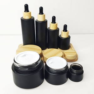 ขวดแก้วใส่เครื่องสำอางสีดำขนาด 30 กรัม แบบกำหนดเองจากโรงงาน สำหรับบรรจุเซรั่มน้ำมันบำรุงเส้นผม ขวดแก้วแบบไหล่เรียบสีด้านพร้อมหัวหยด - Product Image 5