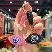 Le nouveau porte-clés œil du diable serti de diamants convient aux décorations intérieures de voiture, aux pendentifs de sac ou aux cadeaux commémoratifs