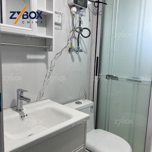 <span class=keywords><strong>Casa</strong></span> Contenedor Expandible de 40 pies con Techo a Dos Aguas Azul Rey, Silla Columpio Blanca para Porche, Cabaña Modular Prefabricada para Bosque - Product Image 4