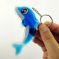 Porte-clés à breloque liquide dauphin mignon personnalisé