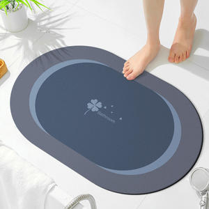 Alfombra de baño de diatomeas ovalada, diseño minimalista, antideslizante, de secado rápido y absorbente para baño y ducha. - Product Image 1