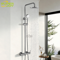 Vente directe usine : Système de douche économique et simple avec pommeau de douche pluie rond et douchette à main pour hôtel