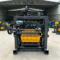 Machine à briques semi-automatique multifonctionnelle QT4-40 pour la fabrication de briques creuses, pleines et autobloquantes en béton, idéale pour les petites usines de construction