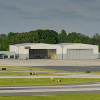 Hangar d'avion préfabriqué en acier, projet clé en main, porte hydraulique, hangar de stockage aéronautique, résistance au vent