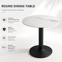 Table de bistrot ronde en pierre frittée avec base métallique stable, design minimaliste pour cafés, hôtels et restaurants