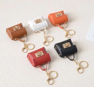 <span class=keywords><strong>2025</strong></span> màu rắn PU da Mini Túi Xách đồng xu Ví mini mặt dây chuyền túi treo trang trí Keychain - Product Image 1