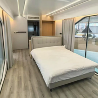 Maison capsule moderne et écologique avec deux chambres, espace de vie, cuisine, matériau en acier imperméable pour villas et appartements