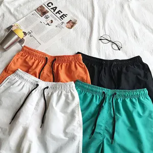 Factory Customized Logo Men Summer Loose Breathable Thin Solid Color Beachwear Wholesale Plus Size Trunk Men's Swim Shorts