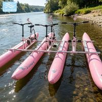 Bouée gonflable ronde tandem en forme de banane avec pédales, cycle aquatique, cadre en aluminium, utilisable en eau peu profonde, disponible depuis l'usine Lumark en Chine
