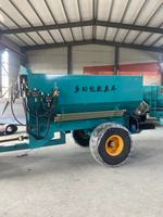 Épandeur d'engrais organique rotatif à traction tracteur, machine à épandre d'engrais solide à engrenages centraux