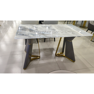 <span class=keywords><strong>Table</strong></span> de salle à manger moderne <span class=keywords><strong>en</strong></span> céramique <span class=keywords><strong>avec</strong></span> <span class=keywords><strong>plateau</strong></span> <span class=keywords><strong>en</strong></span> pierre frittée effet marbre et base métallique - Product Image 2