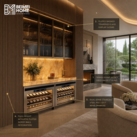 Meuble à vin de style hôtel de luxe avec comptoir en onyx rétroéclairé et rangement pour bar à sec, idéal pour suite parentale et salon