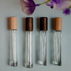 ขวดน้ำหอมพรีเมียม 10 มล. แบบแก้วโรลออน ฝาไม้วอลนัทและไม้บีช สำหรับน้ำหอมพกพา - Product Image 1