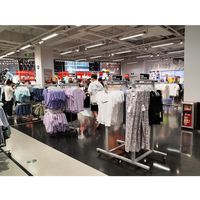 Service tout-en-un pour magasin de chaussures sur mesure, éclairage LED, étagères flottantes pour chaussures, présentoir écologique pour chaussures de sport et baskets